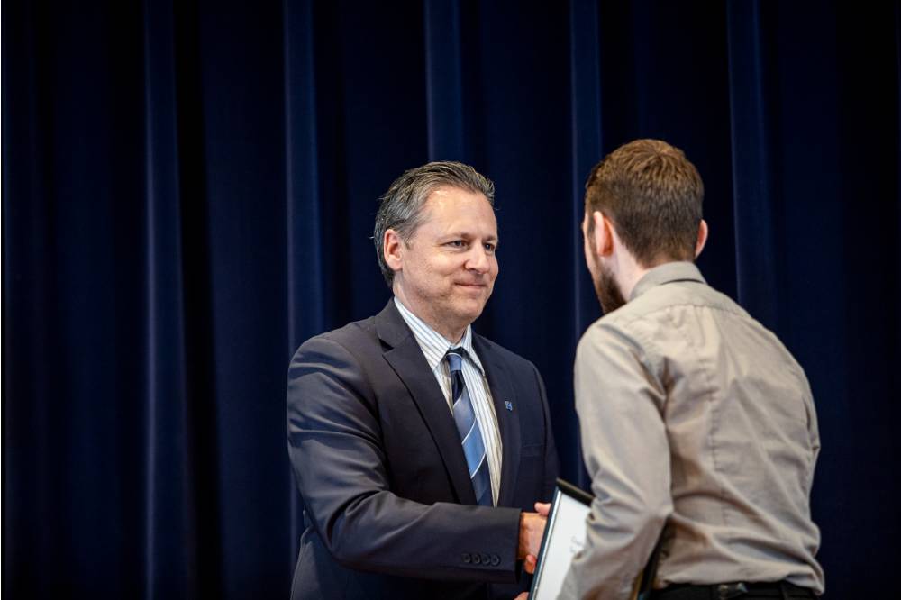 Dr. Chris Plouff (left) and Brock Buozis (right).